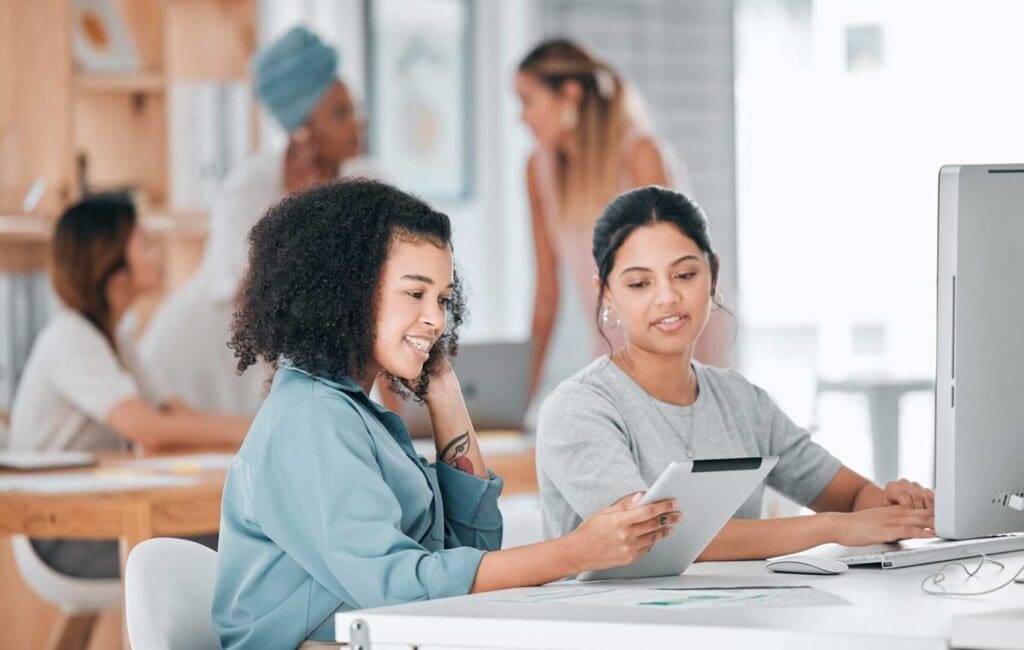 women in creative agency planning on tablet compu 2022 12 10 00 16 14 utc scaled 1